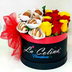 Caja de rosas con fresas